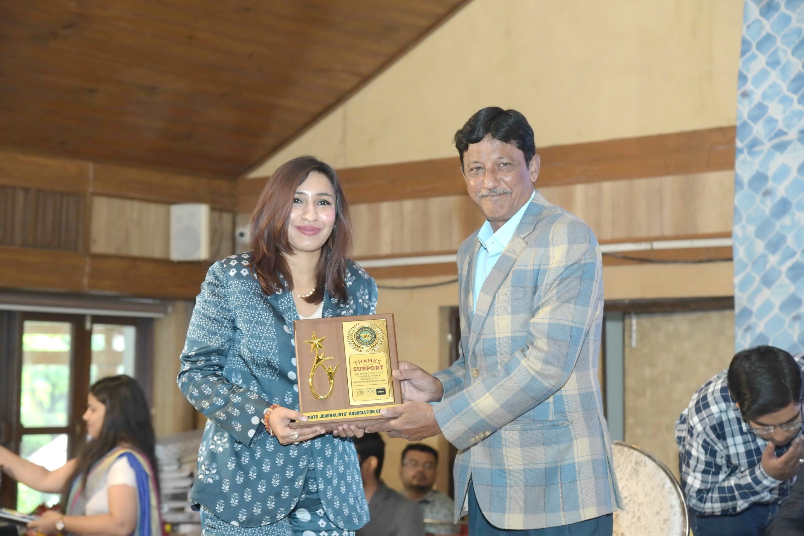 A program honoring famous athletes and coaches was held at the Rajpath Club in Ahmedabad